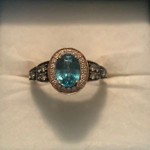 Levian topaz and diamond ring in 14K yellow gold.